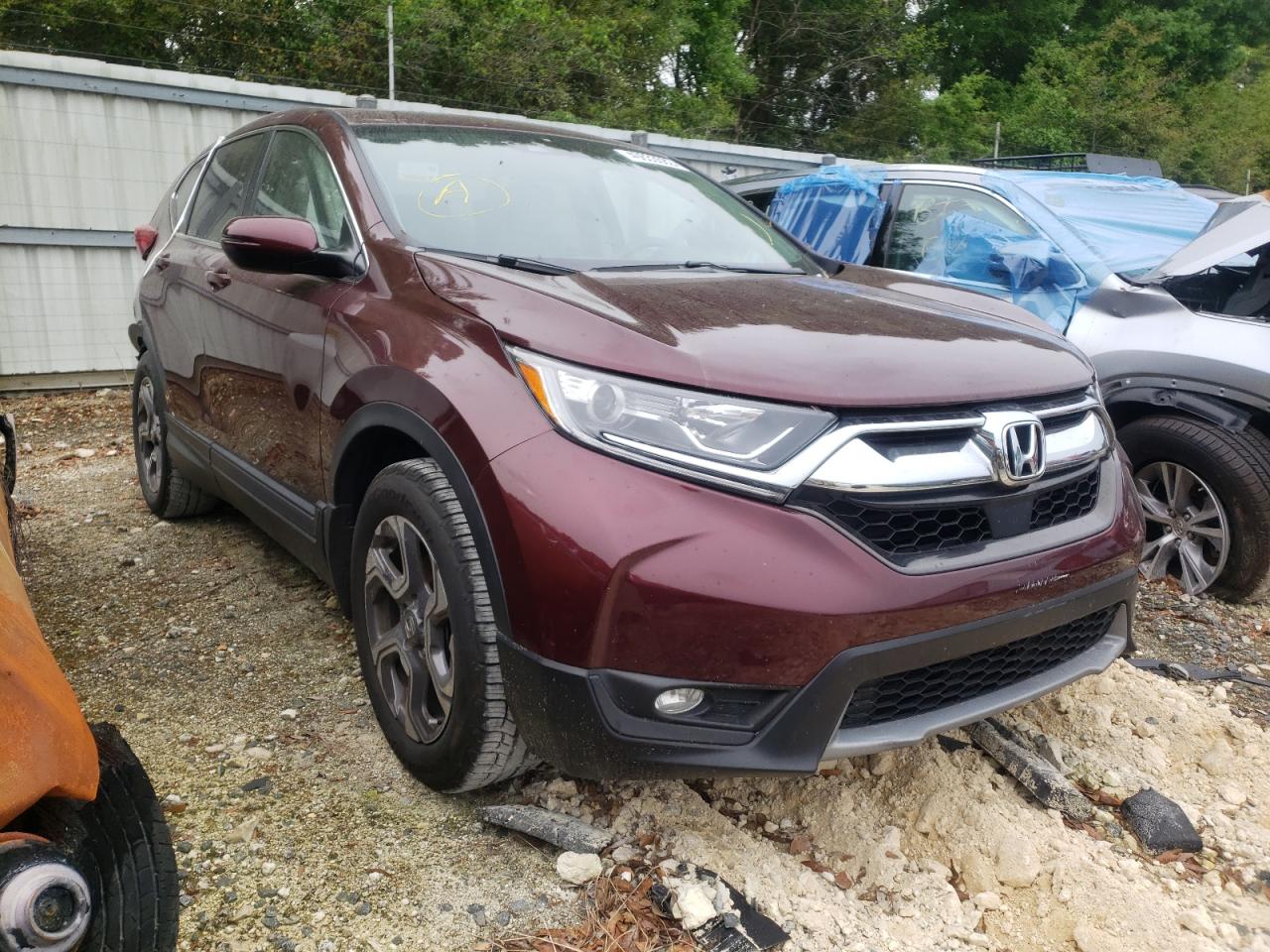 HONDA CR-V EX 2018 with VIN 7FARW1H50JE034975 - Photo from auction