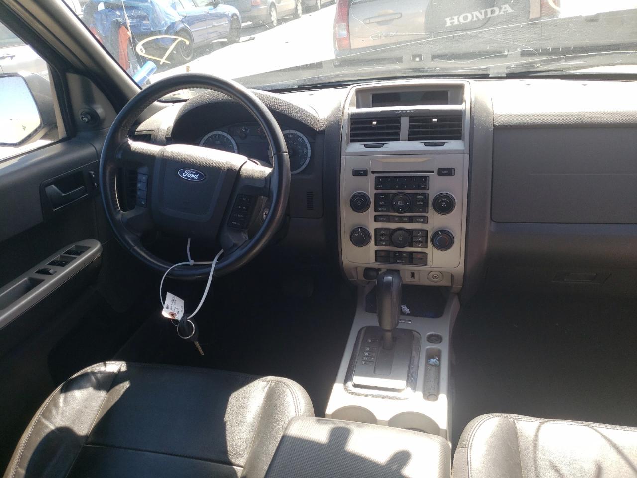 Photo 9 from auction – 2011 FORD ESCAPE XLT with VIN 1FMCU9DG9BKA21977