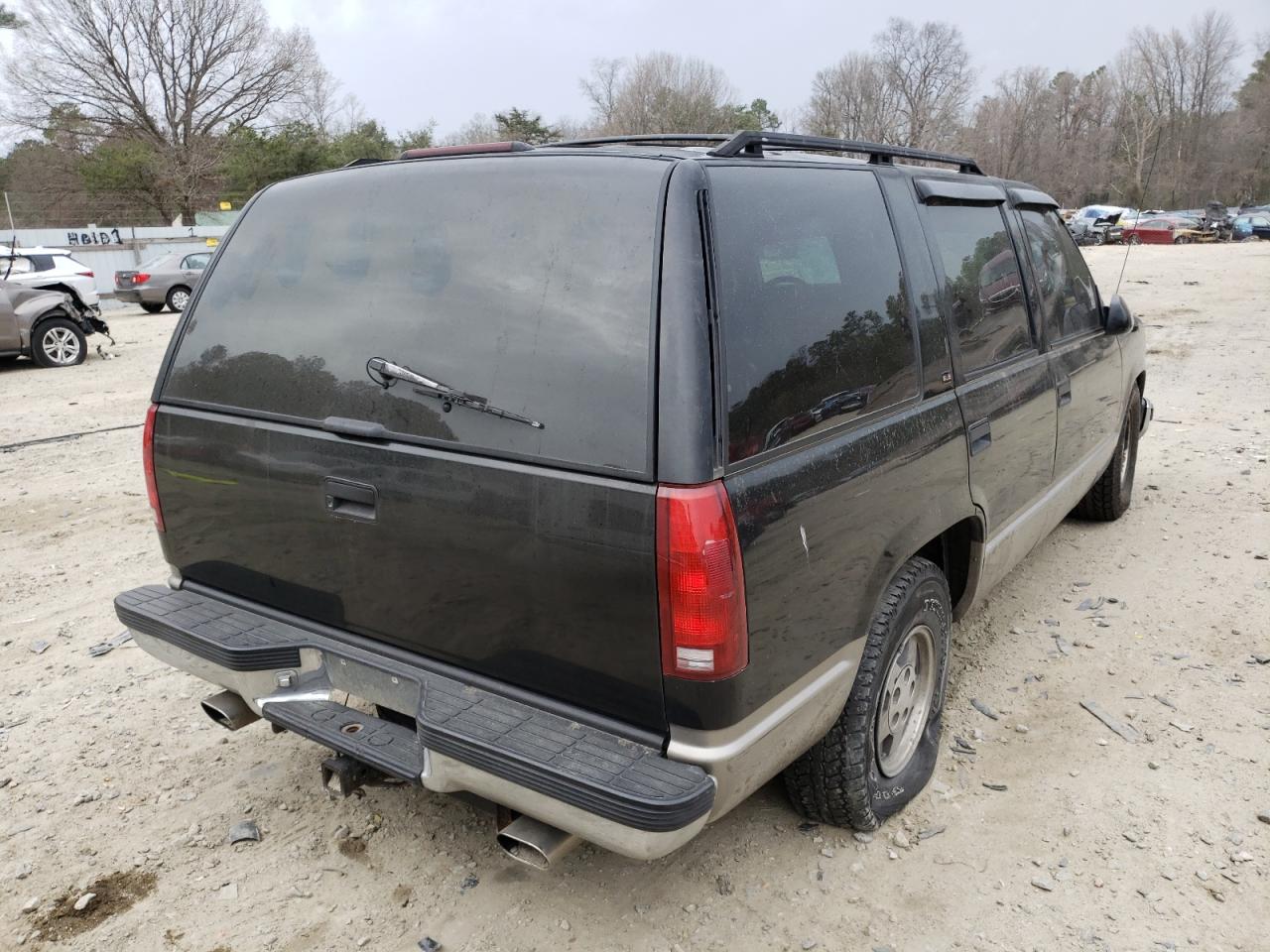 Photo 4 from auction – 1999 GMC YUKON with VIN 1GKEC13R2XJ809487
