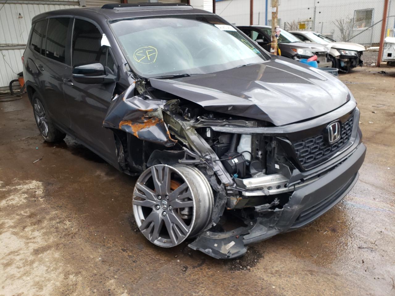 Photo 9 from auction – 2019 HONDA PASSPORT E with VIN 5FNYF8H50KB011312