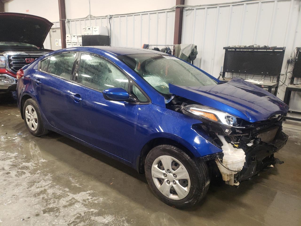 KIA FORTE LX 2017 with VIN 3KPFK4A79HE087570 - Photo from auction