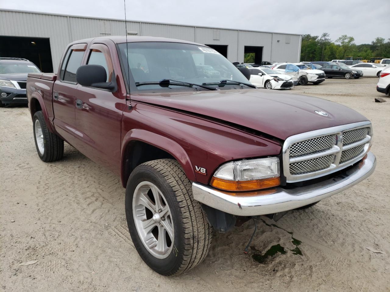 DODGE DAKOTA QUA 2000 with VIN 1B7GG2AN4YS792122 - Photo from auction