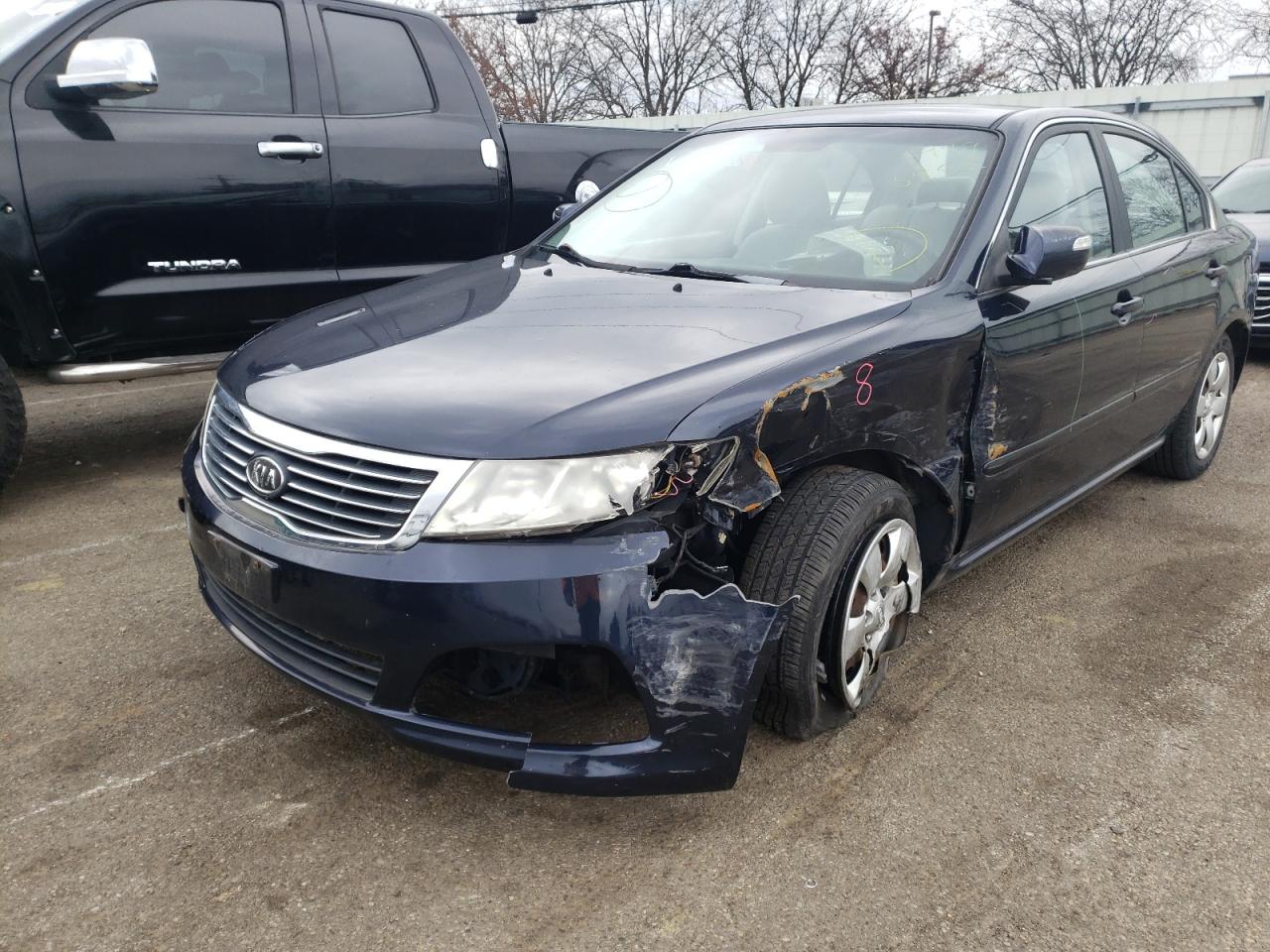 Photo 9 from auction – 2009 KIA OPTIMA LX with VIN KNAGE228095306904