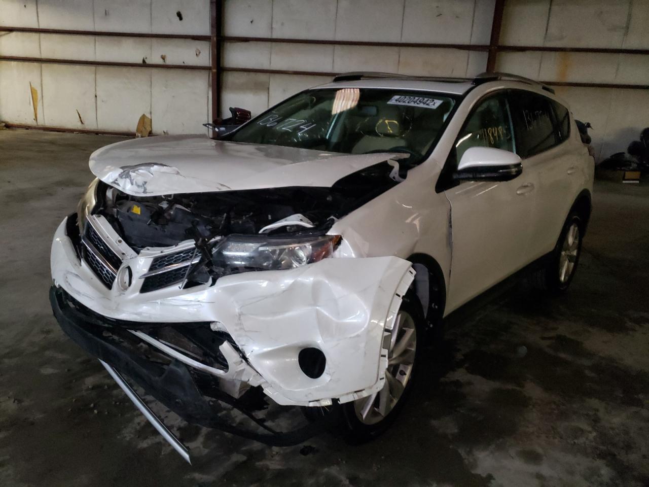 Photo 2 from auction – 2014 TOYOTA RAV4 LIMIT with VIN 2T3YFREV0EW130079