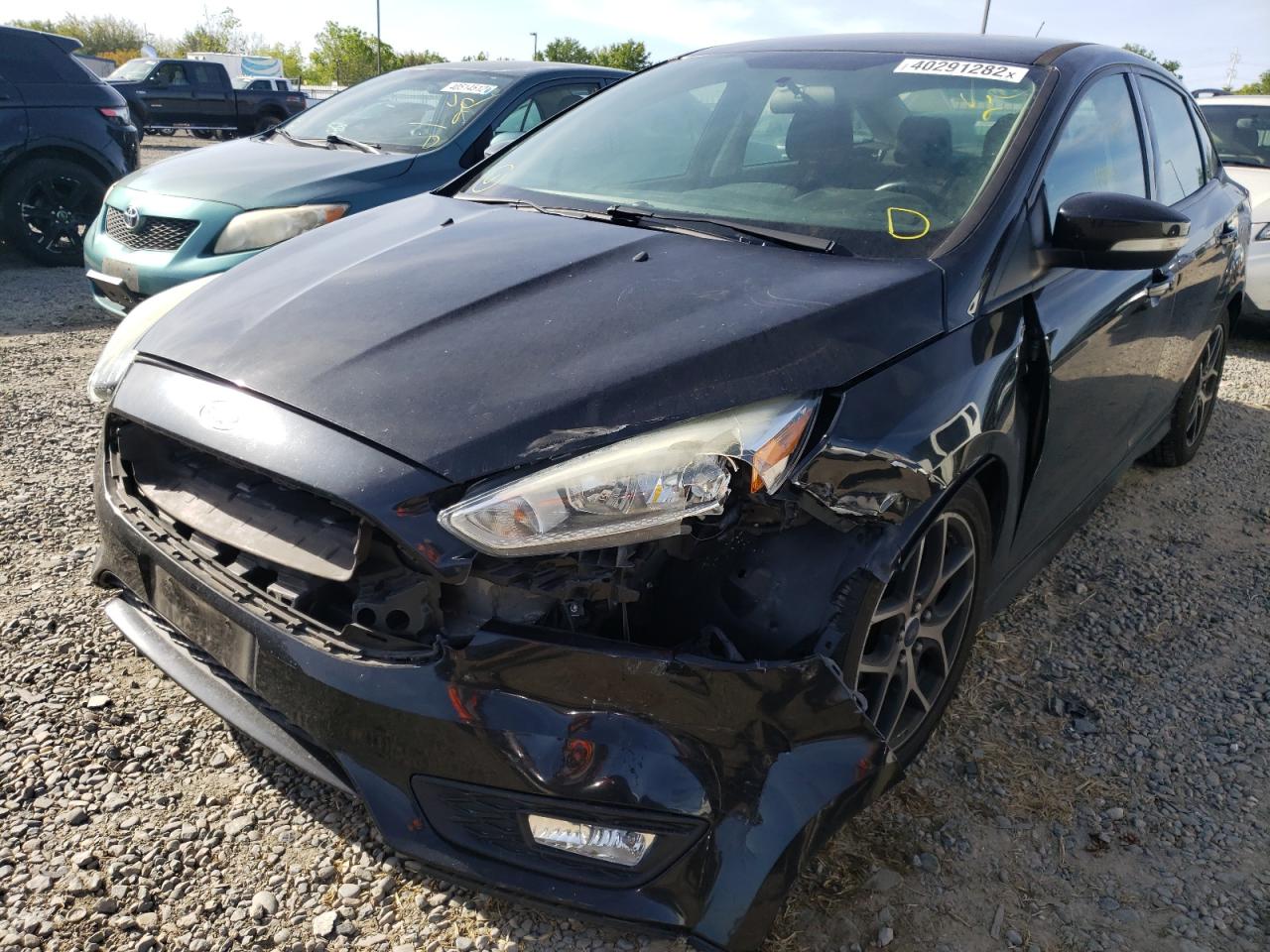 Photo 9 from auction – 2015 FORD FOCUS SE with VIN 1FADP3F22FL275387