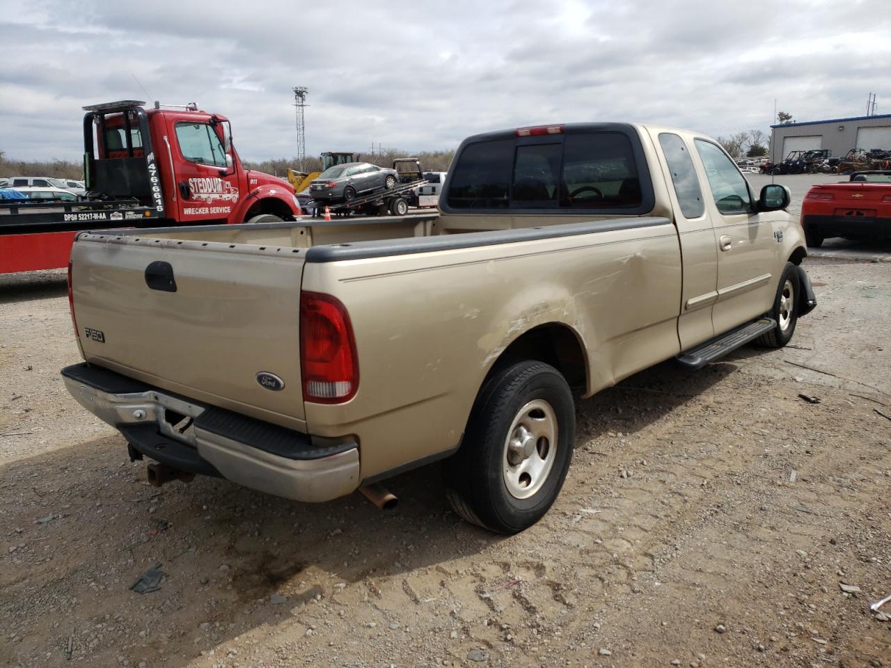 Photo 4 from auction – 1999 FORD F150 with VIN 1FTRX17W4XKC06858