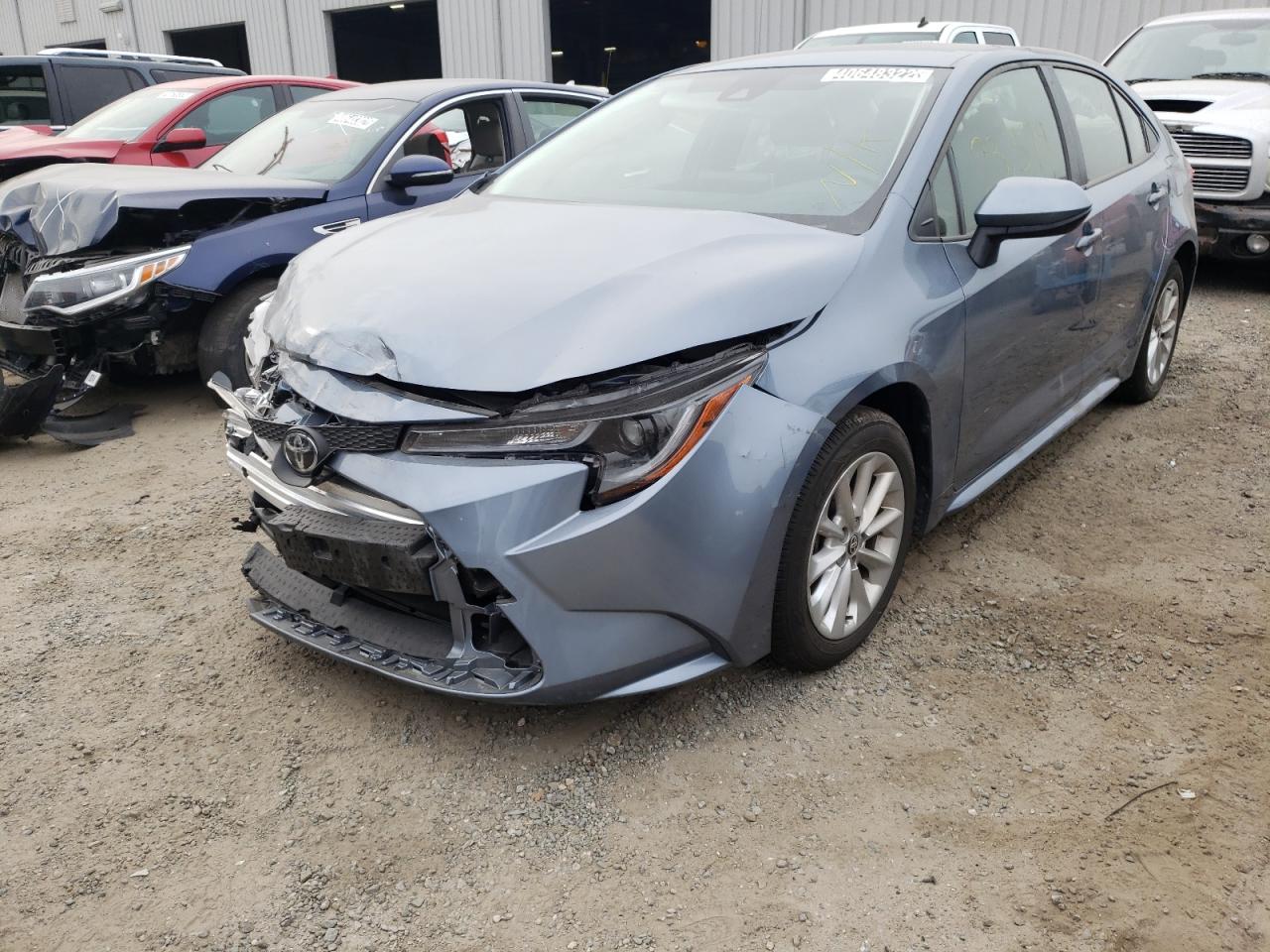 Photo 2 from auction – 2021 TOYOTA COROLLA LE with VIN JTDVPMAE4MJ134366
