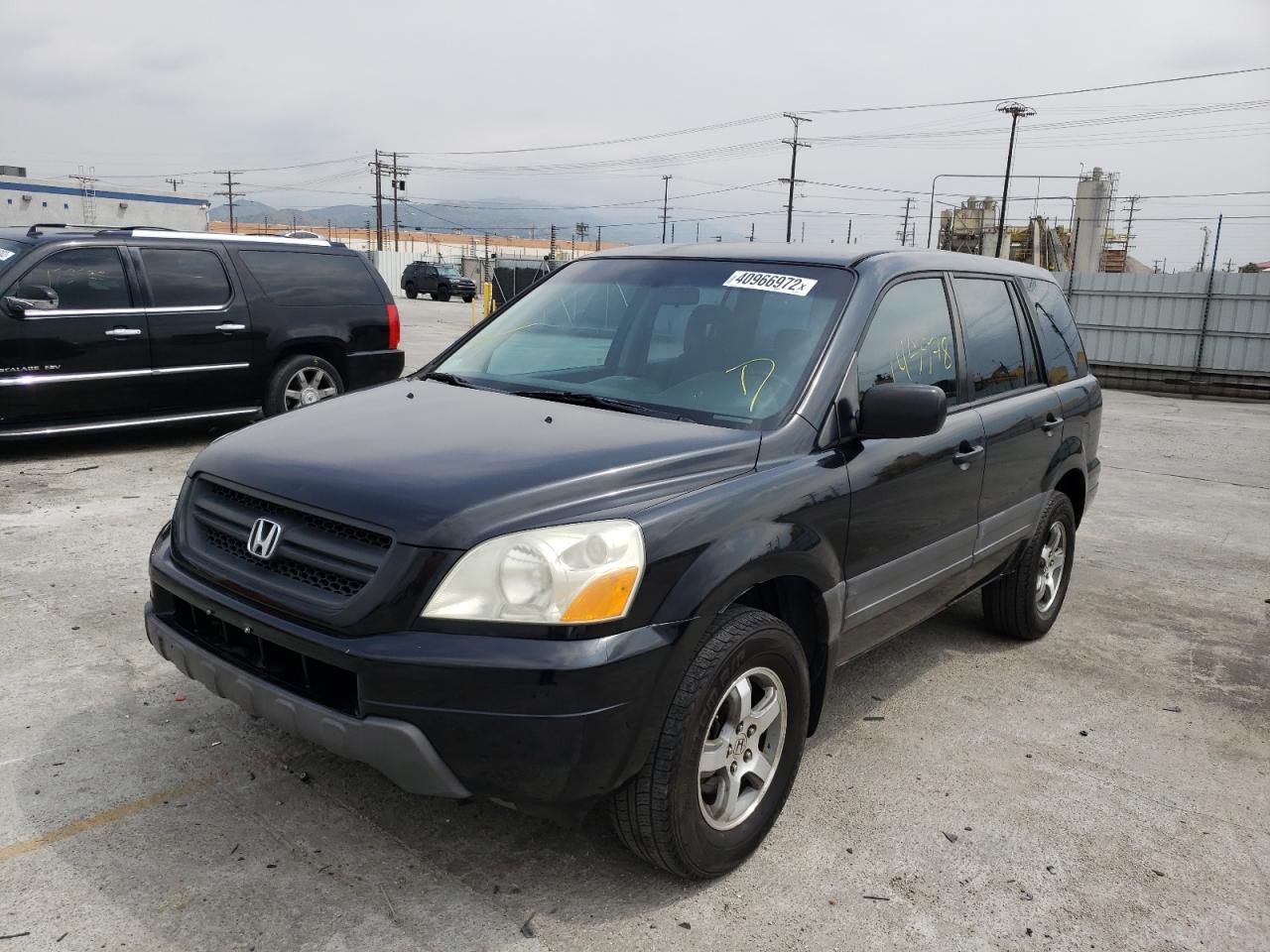 Photo 2 from auction – 2005 HONDA PILOT LX with VIN 2HKYF18125H533157