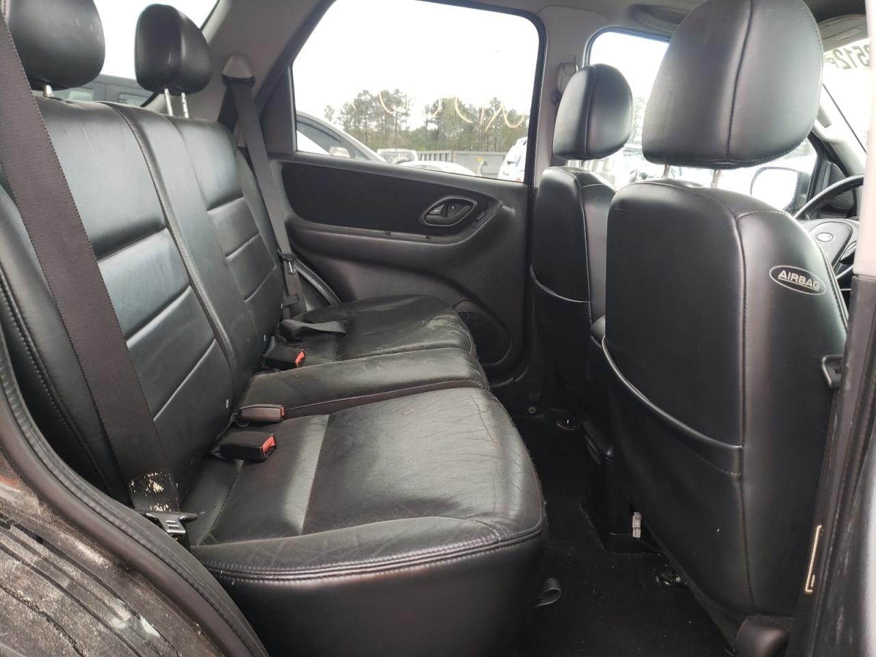 Photo 6 from auction – 2003 FORD ESCAPE LIM with VIN 1FMCU94153KC54249