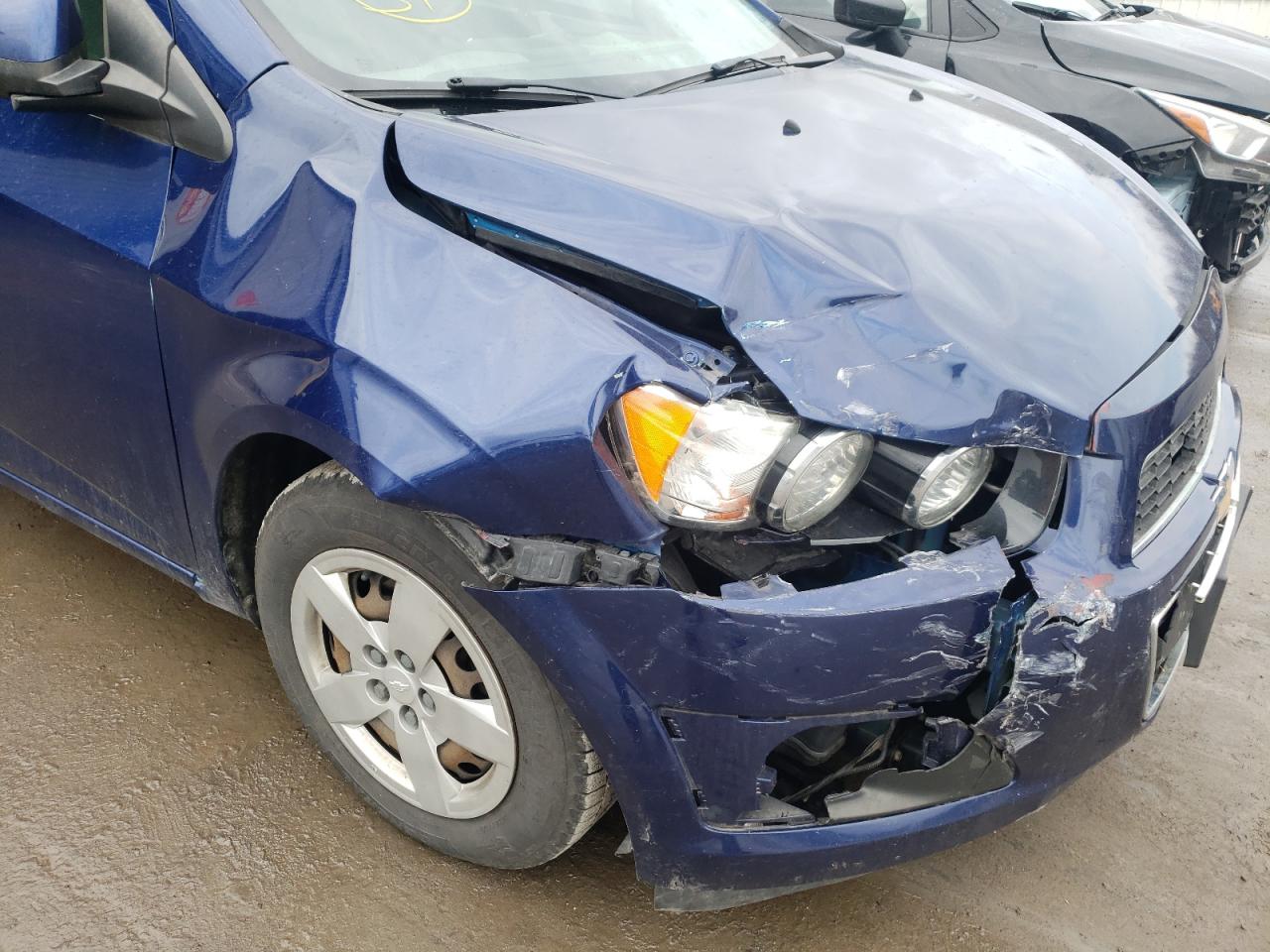 Photo 9 from auction – 2013 CHEVROLET SONIC LS with VIN 1G1JA5SG9D4179669