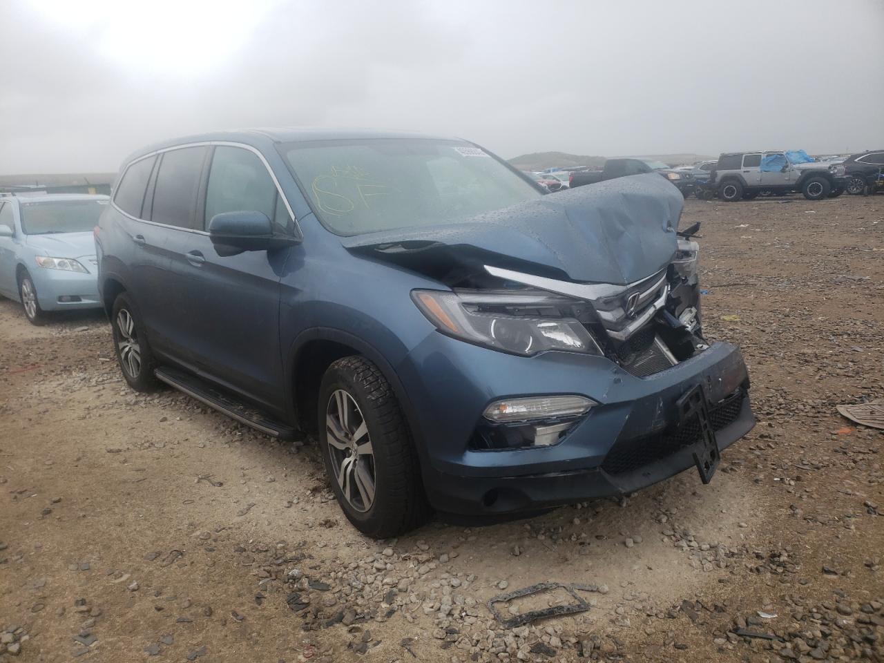 HONDA PILOT EXL 2016 with VIN 5FNYF5H55GB025891 - Photo from auction