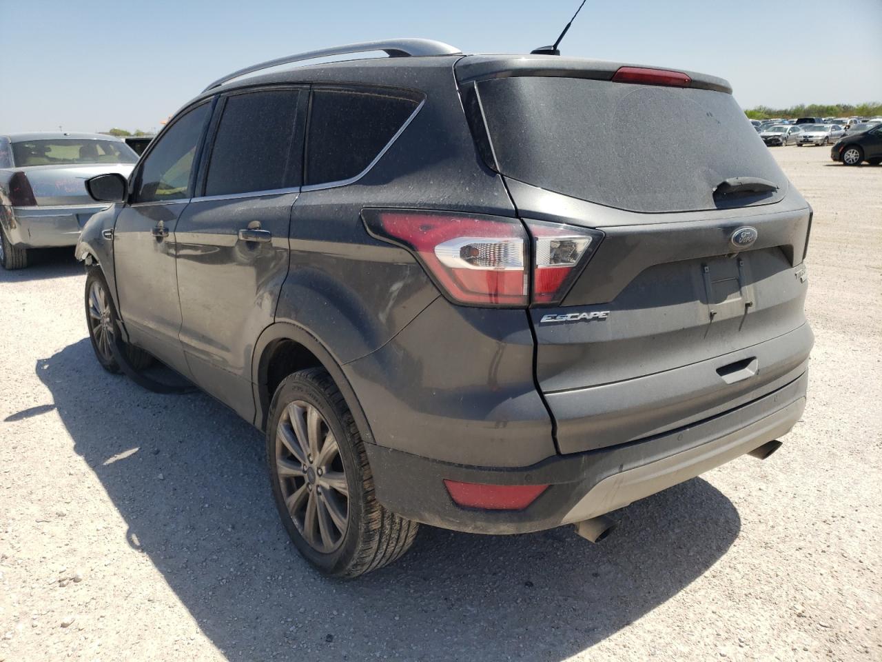 Photo 3 from auction – 2017 FORD ESCAPE TIT with VIN 1FMCU0J97HUC13882