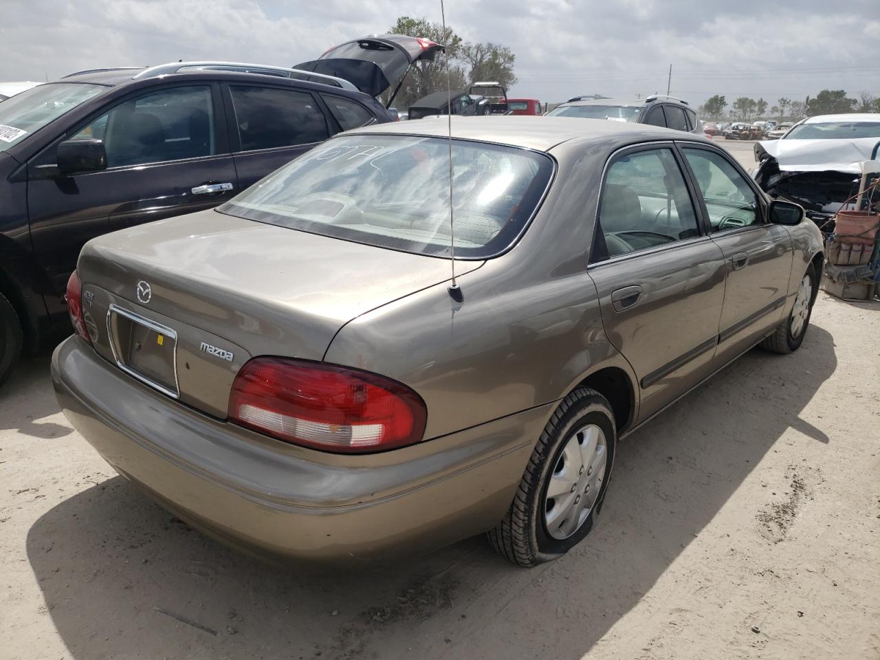 Photo 4 from auction – 1998 MAZDA 626 DX with VIN 1YVGF22C4W5758008