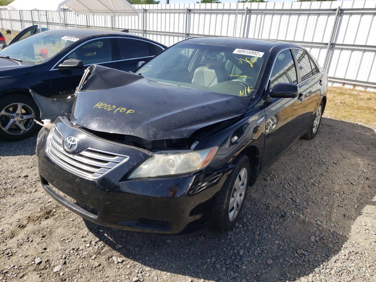 Photo 2 from auction – 2007 TOYOTA CAMRY HYBR with VIN JTNBB46K073035449