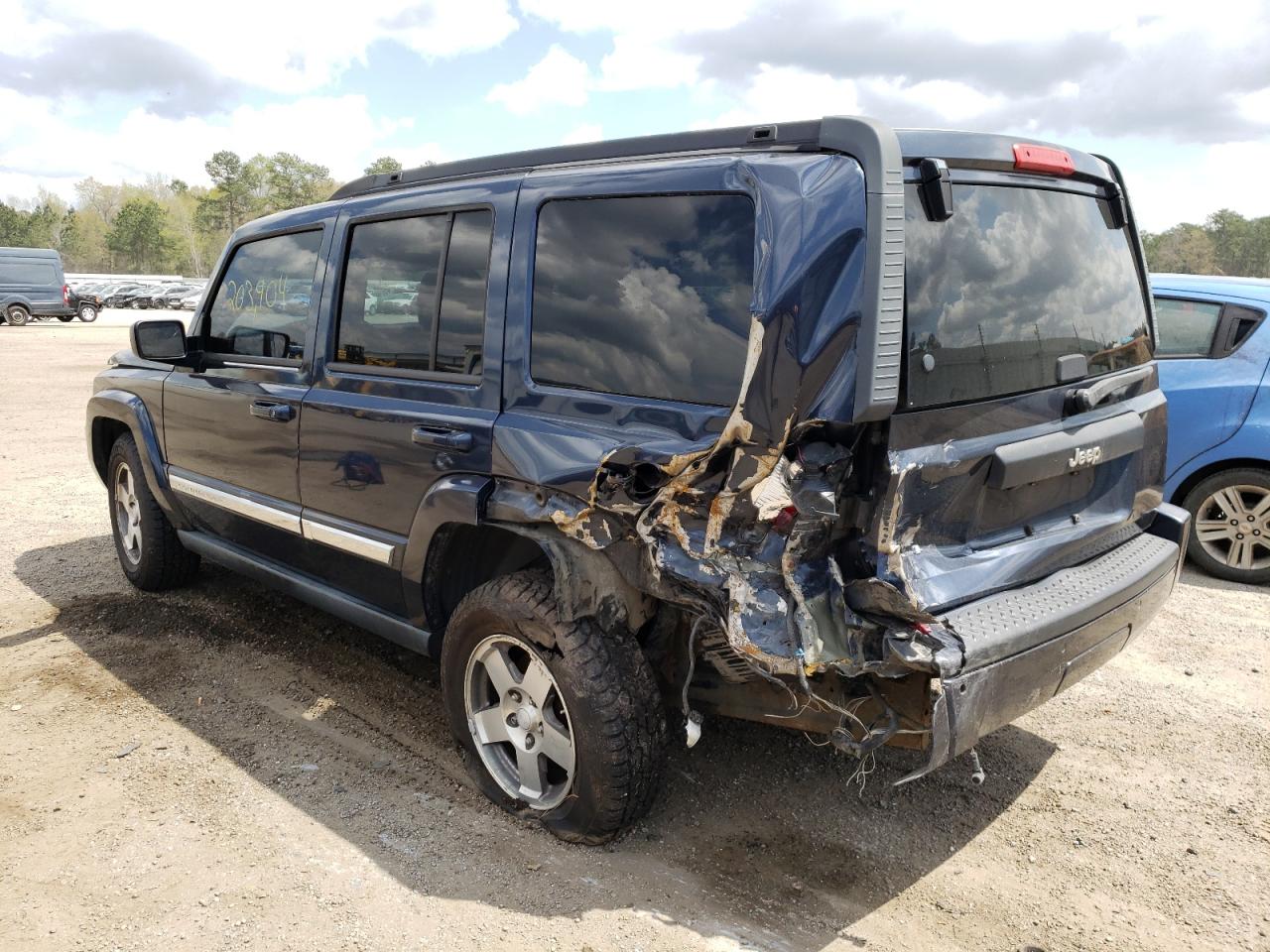 Photo 3 from auction – 2010 JEEP COMMANDER with VIN 1J4RG4GK3AC128065