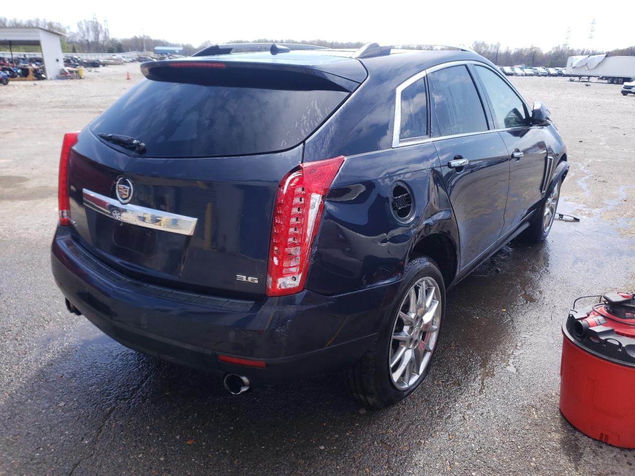 Photo 4 from auction – 2014 CADILLAC SRX LUXURY with VIN 3GYFNEE30ES581523