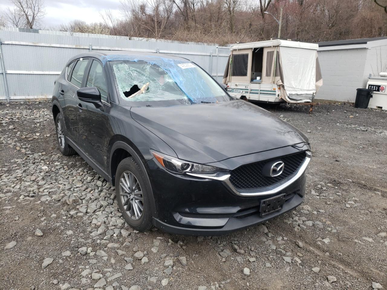 MAZDA CX-5 SPORT 2018 with VIN JM3KFBBM0J0310242 - Photo from auction