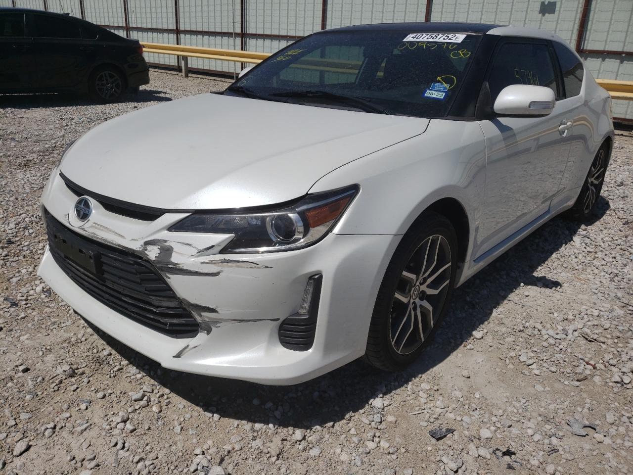 Photo 12 from auction – 2015 TOYOTA SCION TC with VIN JTKJF5C72FJ009576