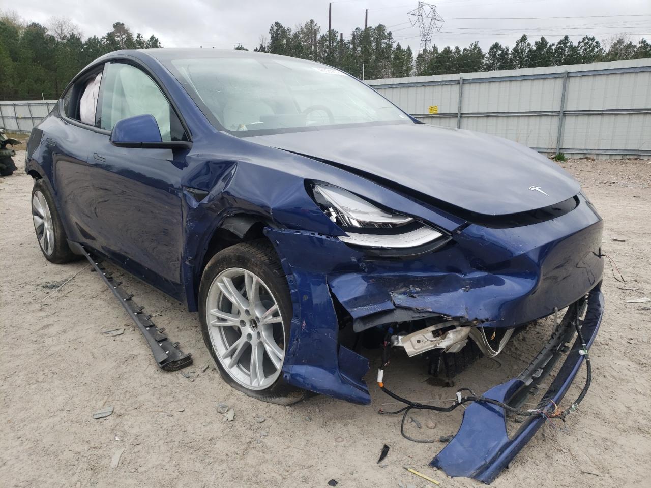 TESLA MODEL Y 2021 with VIN 5YJYGDED2MF104935 - Photo from auction