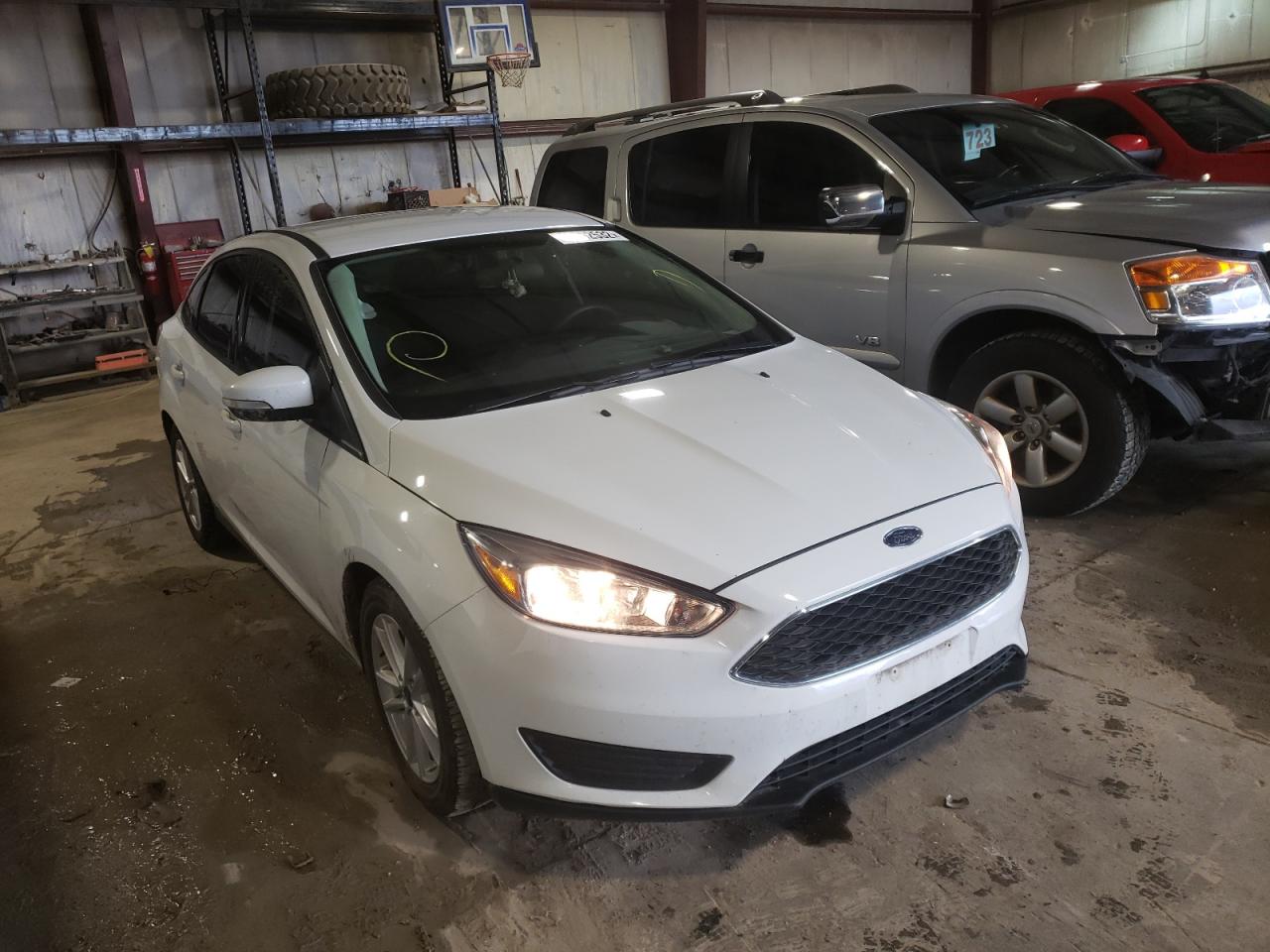 FORD FOCUS SE 2018 with VIN 1FADP3F26JL267155 - Photo from auction