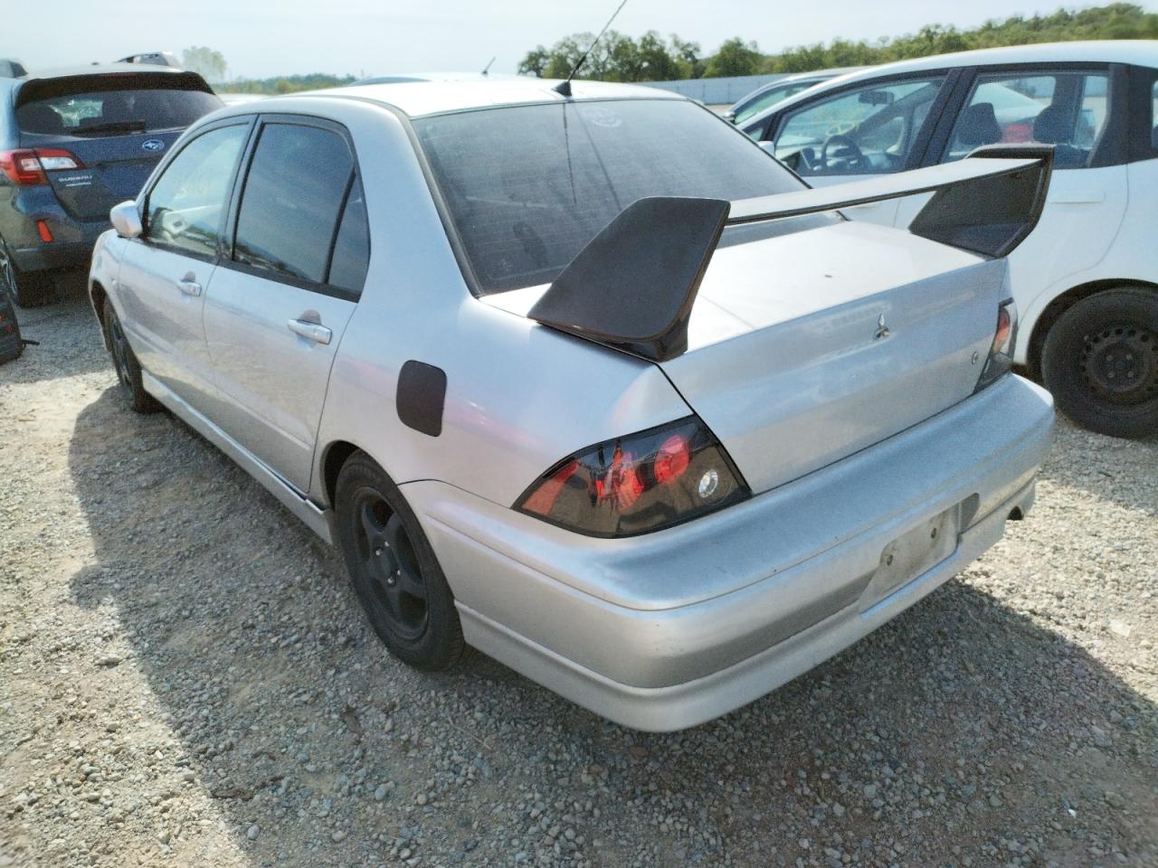 Photo 3 from auction – 2002 MITSUBISHI LANCER OZ with VIN JA3AJ86E72U081883