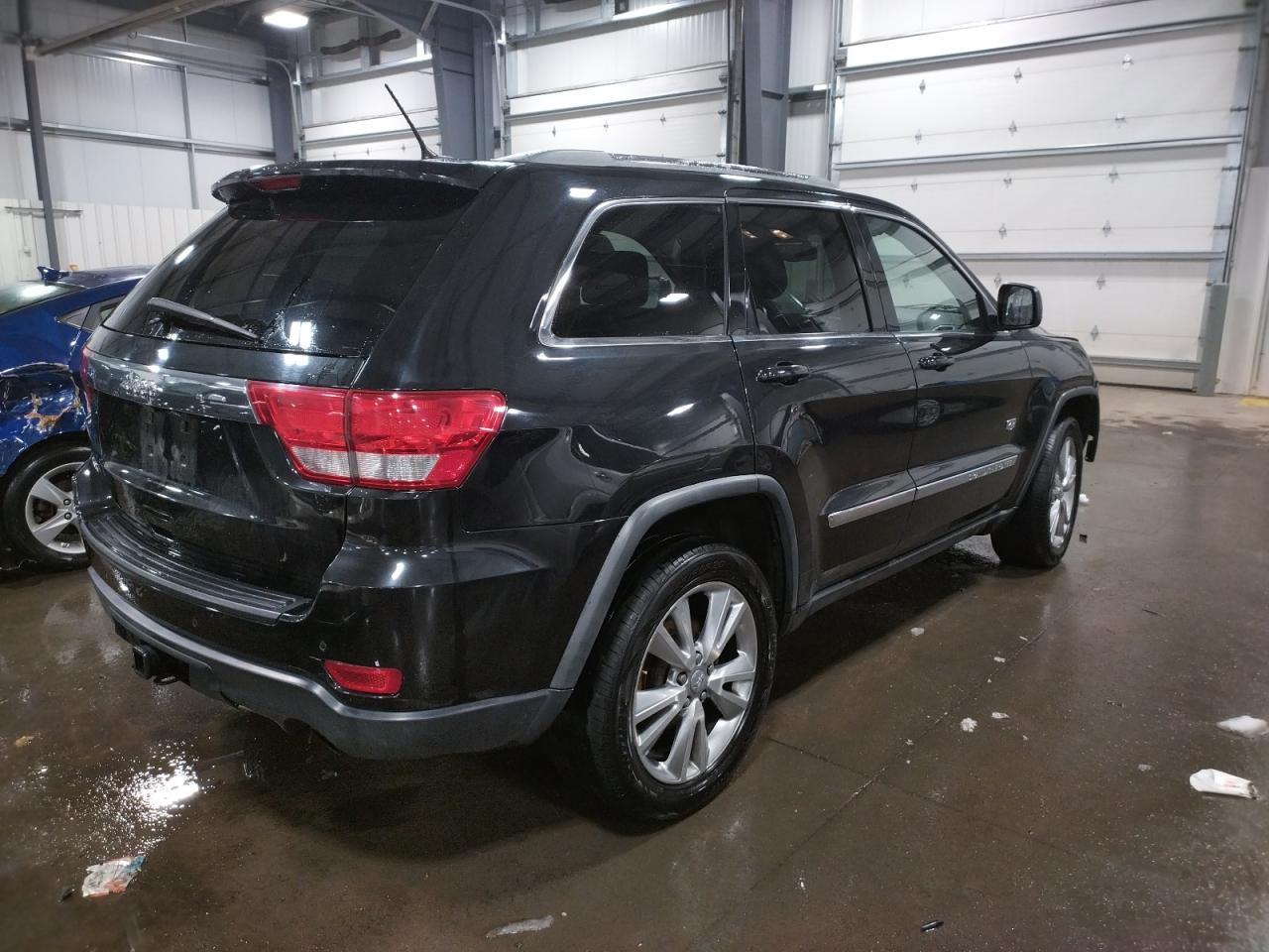 Photo 4 from auction – 2011 JEEP GRAND CHER with VIN 1J4RR4GT1BC675260
