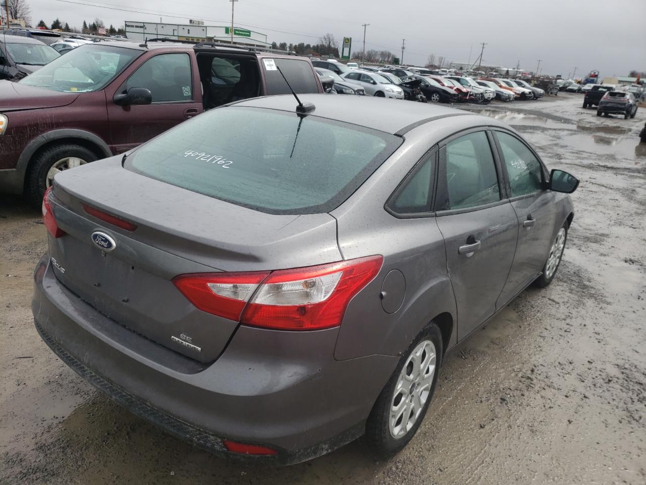 Photo 16 from auction – 2014 FORD FOCUS SE with VIN 1FADP3F23EL100872