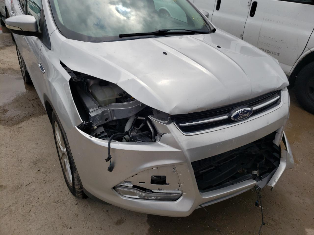 Photo 9 from auction – 2014 FORD ESCAPE TIT with VIN 1FMCU9JX5EUA09791