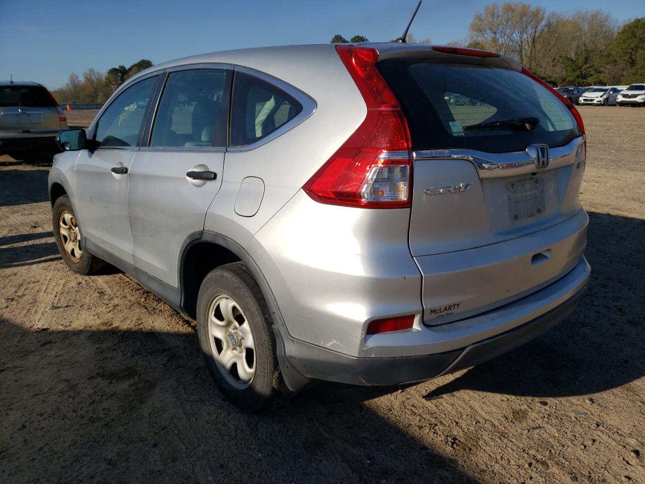 Photo 3 from auction – 2015 HONDA CR-V LX with VIN 5J6RM4H37FL075989