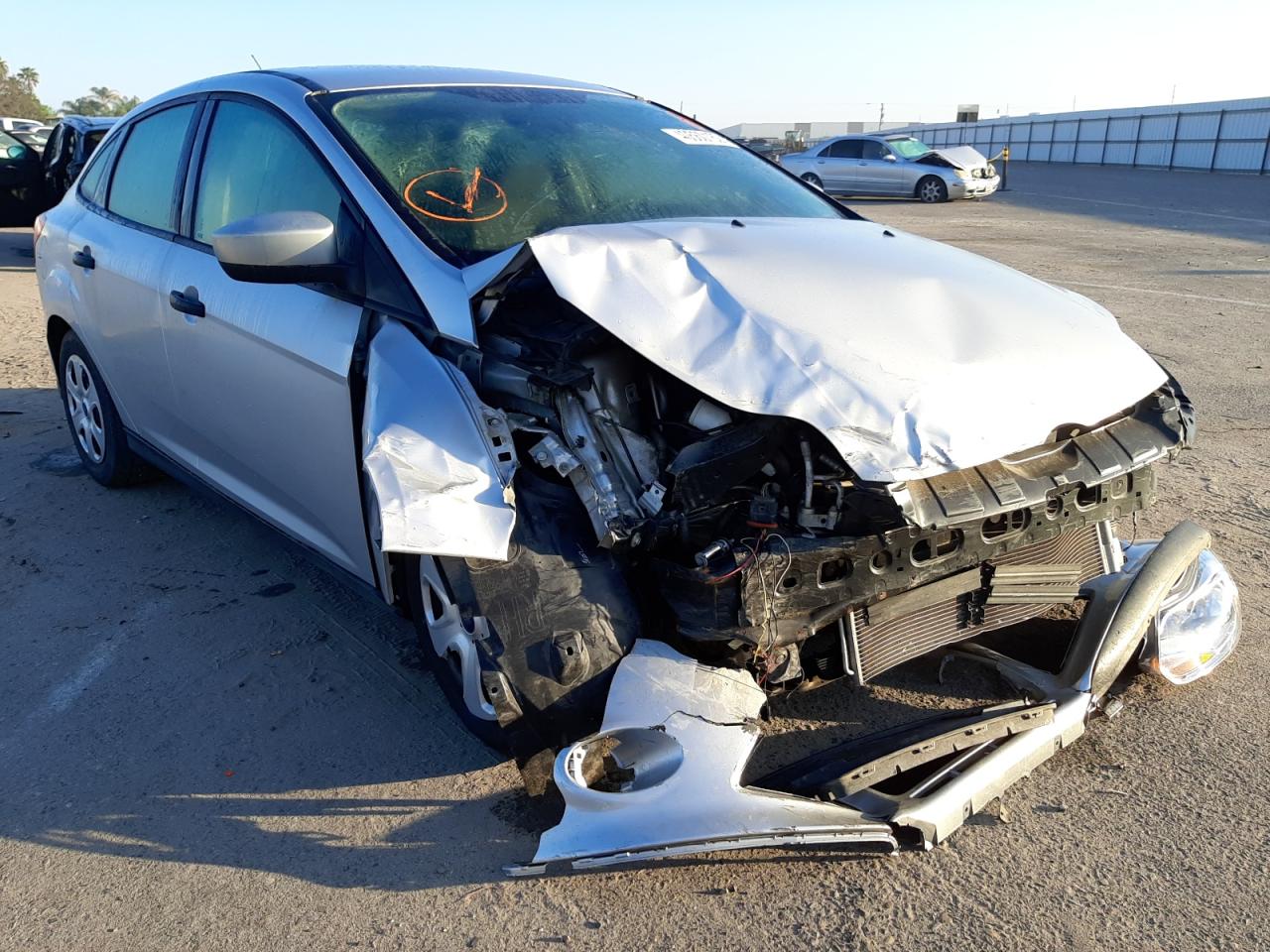 FORD FOCUS S 2012 with VIN 1FAHP3E22CL400757 - Photo from auction