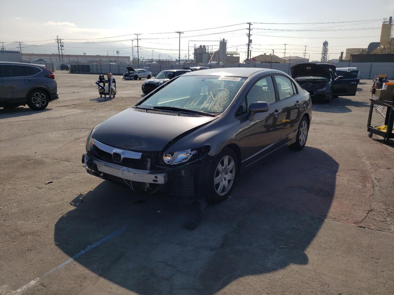 Photo 2 from auction – 2010 HONDA CIVIC LX with VIN 19XFA1F52AE044039
