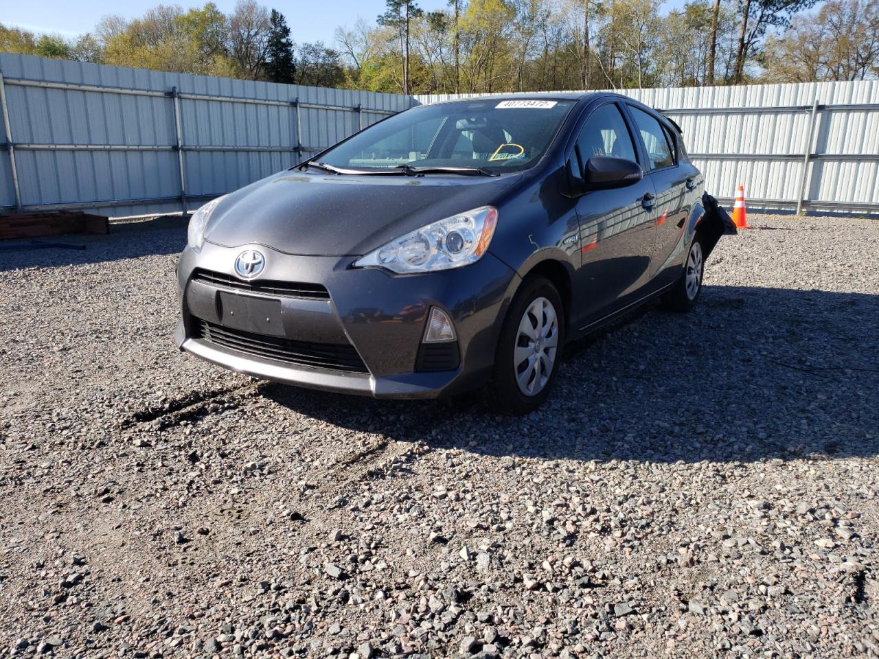 Photo 2 from auction – 2014 TOYOTA PRIUS C with VIN JTDKDTB39E1083080