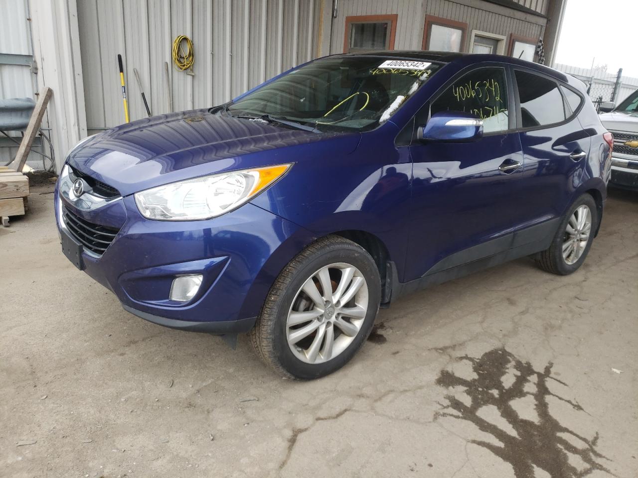 Photo 2 from auction – 2011 HYUNDAI TUCSON GLS with VIN KM8JU3AC8BU208525