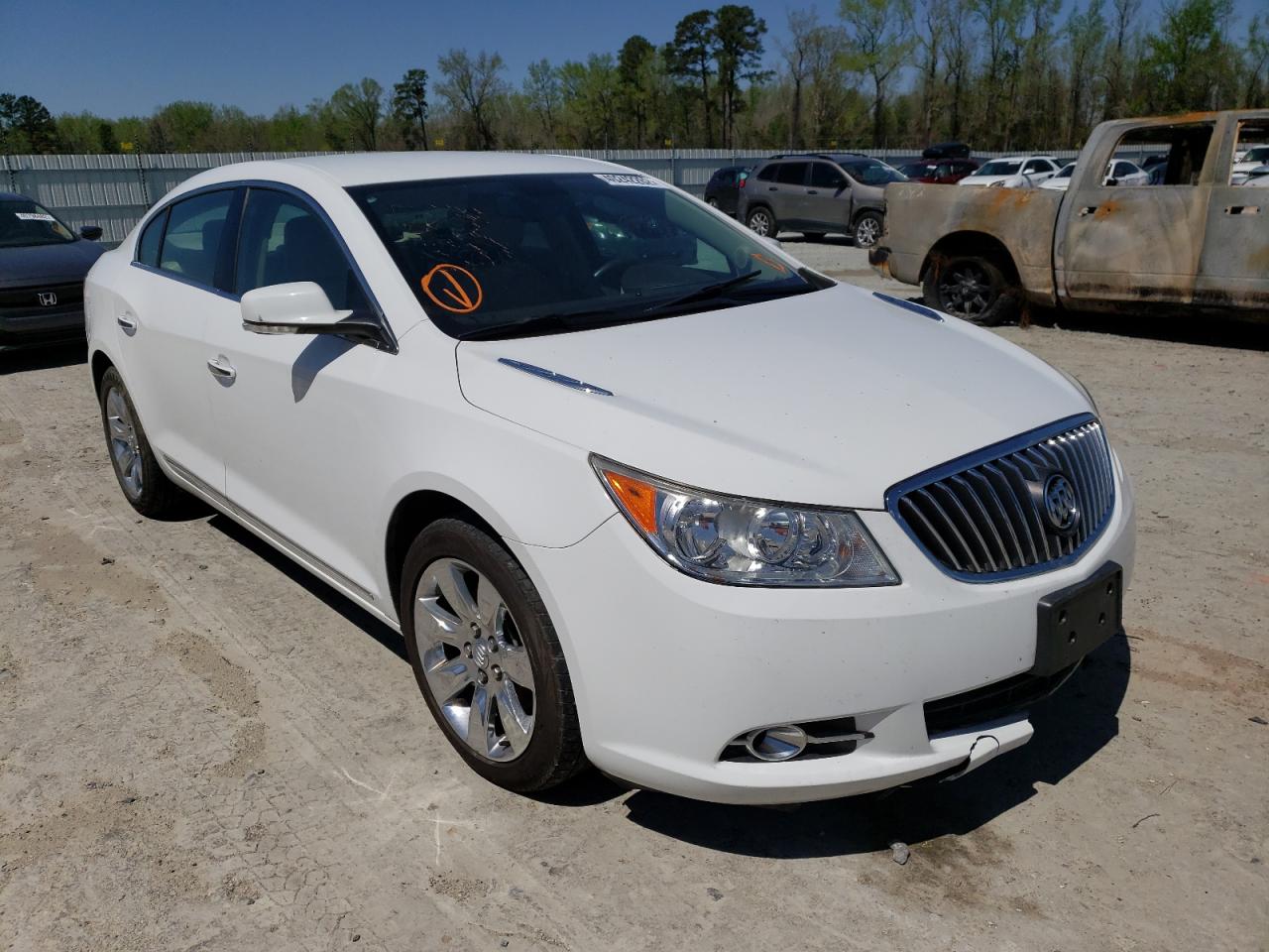 BUICK LACROSSE 2013 with VIN 1G4GC5E32DF286681 - Photo from auction