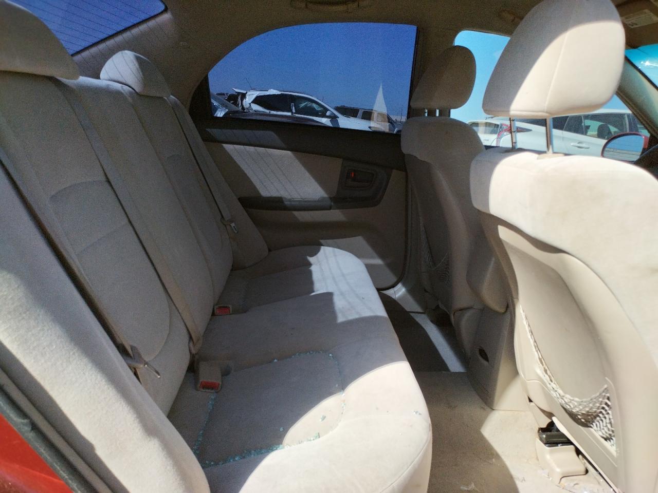 Photo 6 from auction – 2004 KIA SPECTRA LX with VIN KNAFE122545033484