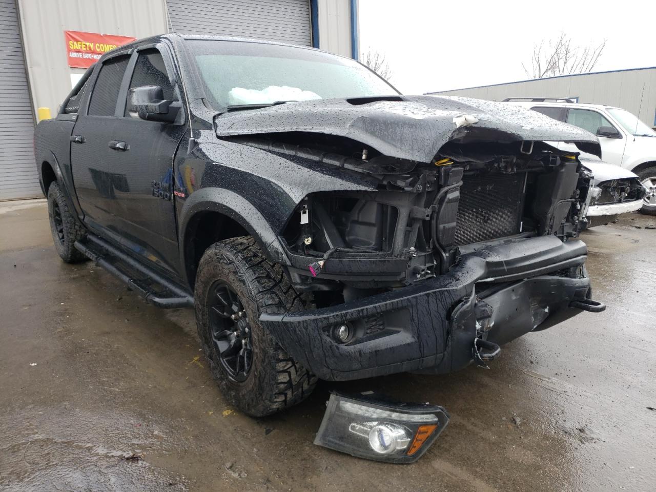 RAM 1500 REBEL 2018 with VIN 1C6RR7YT7JS204196 - Photo from auction