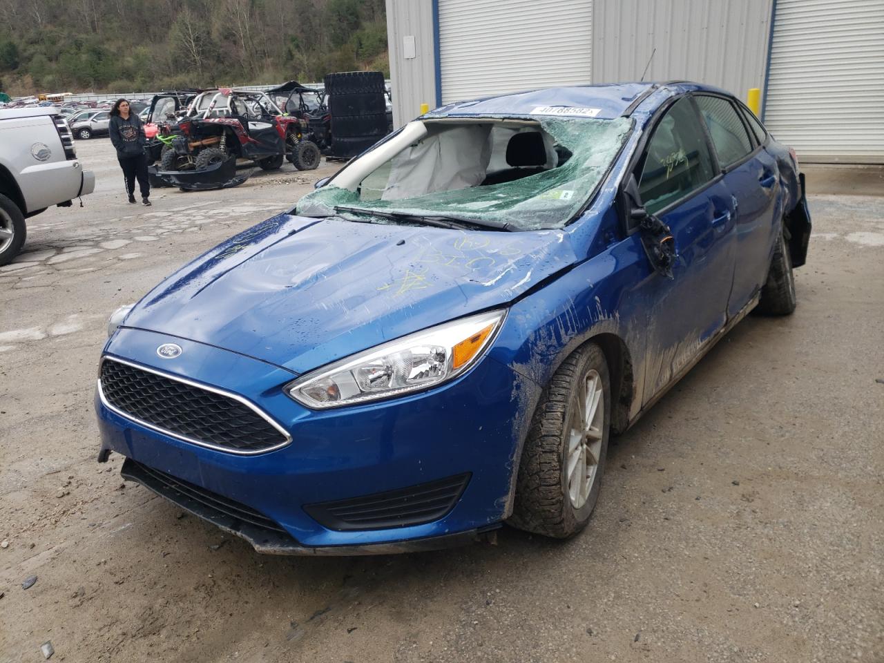 Photo 2 from auction – 2018 FORD FOCUS SE with VIN 1FADP3F29JL210075