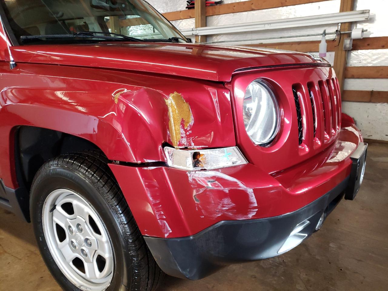Photo 9 from auction – 2016 JEEP PATRIOT SP with VIN 1C4NJPBB2GD699788