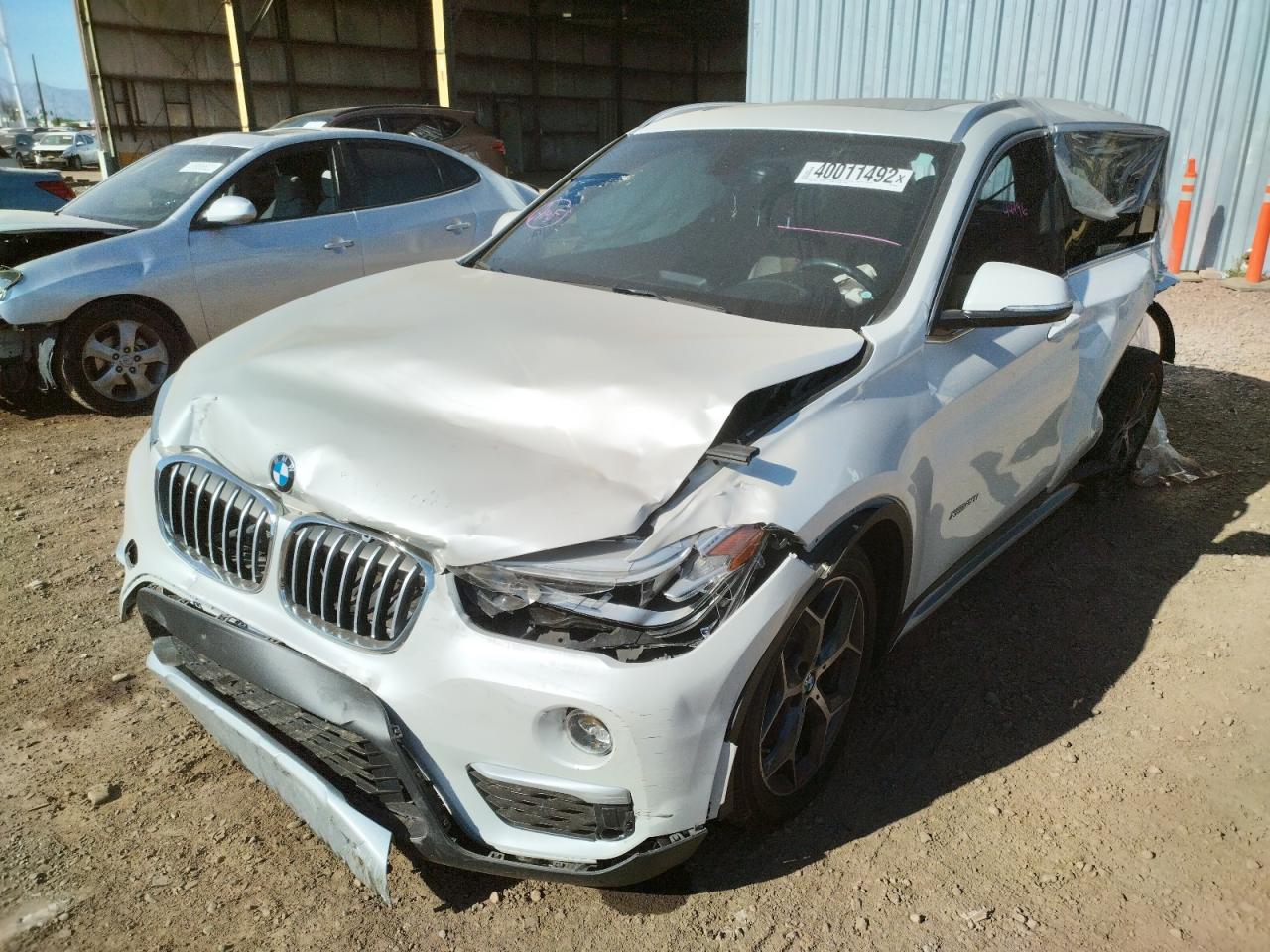 Photo 2 from auction – 2016 BMW X1 XDRIVE2 with VIN WBXHT3C33GP888586