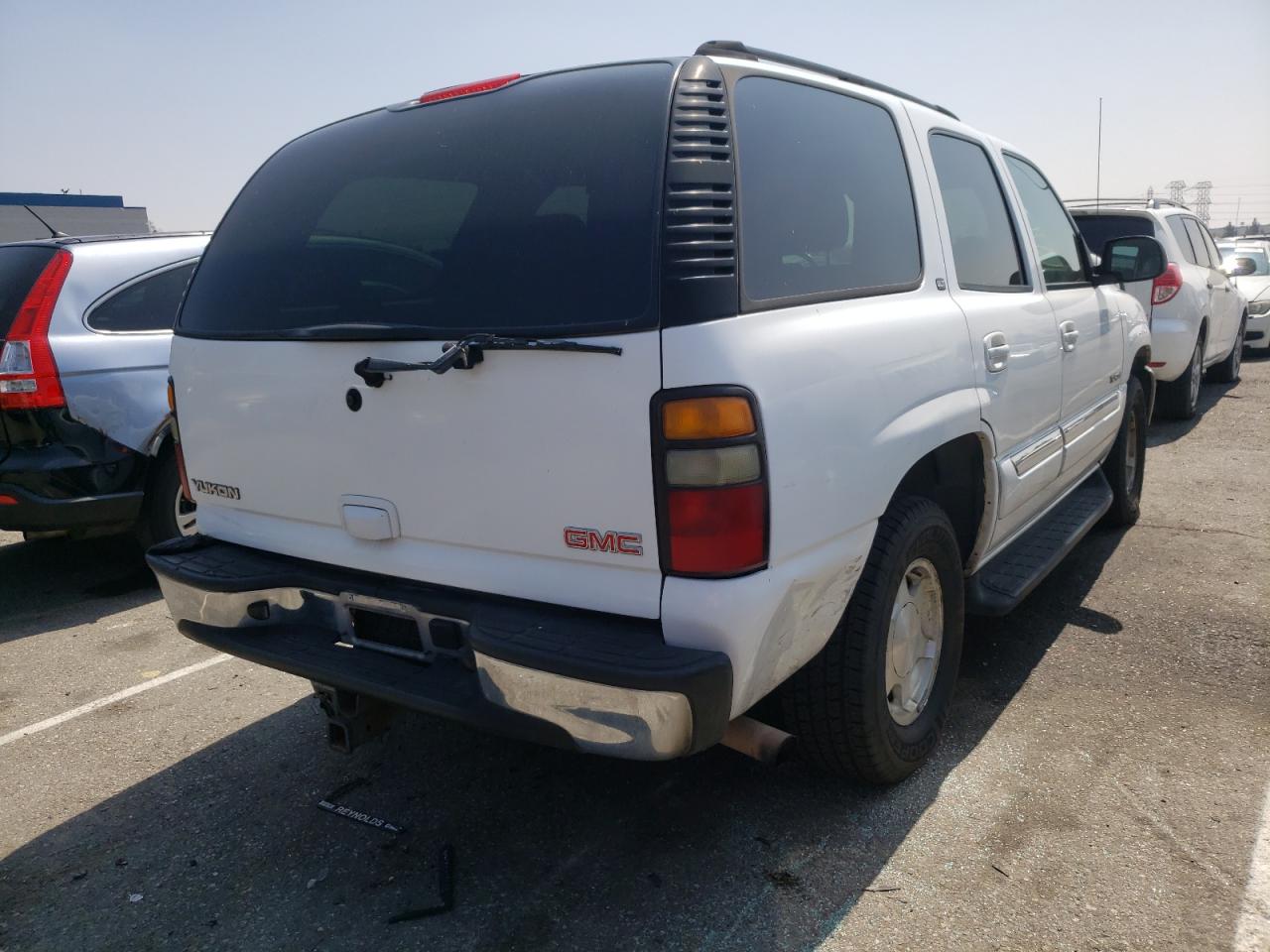 Photo 4 from auction – 2004 GMC YUKON with VIN 1GKEC13TX4R274756