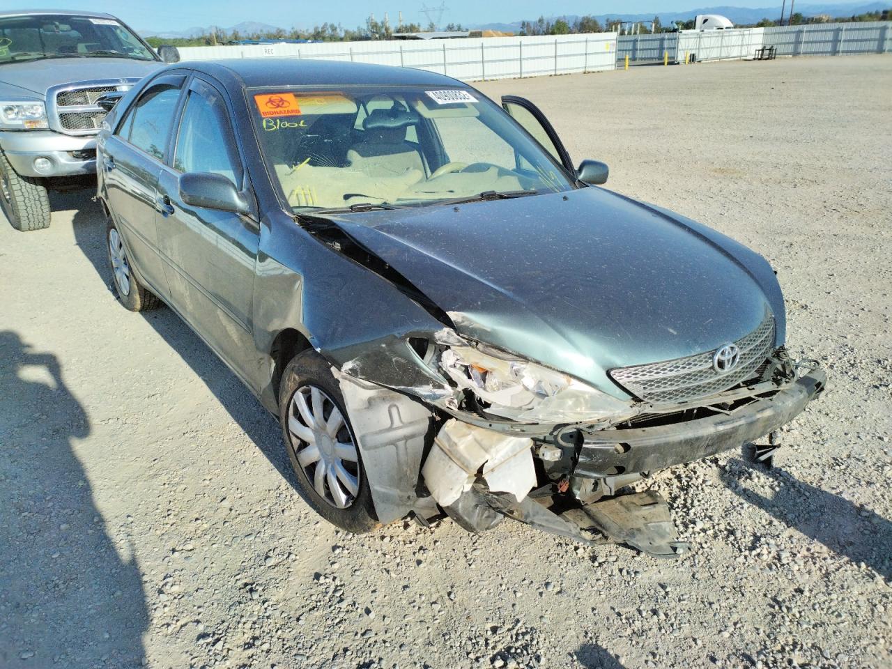 TOYOTA CAMRY LE 2003 with VIN 4T1BE32K43U737804 - Photo from auction