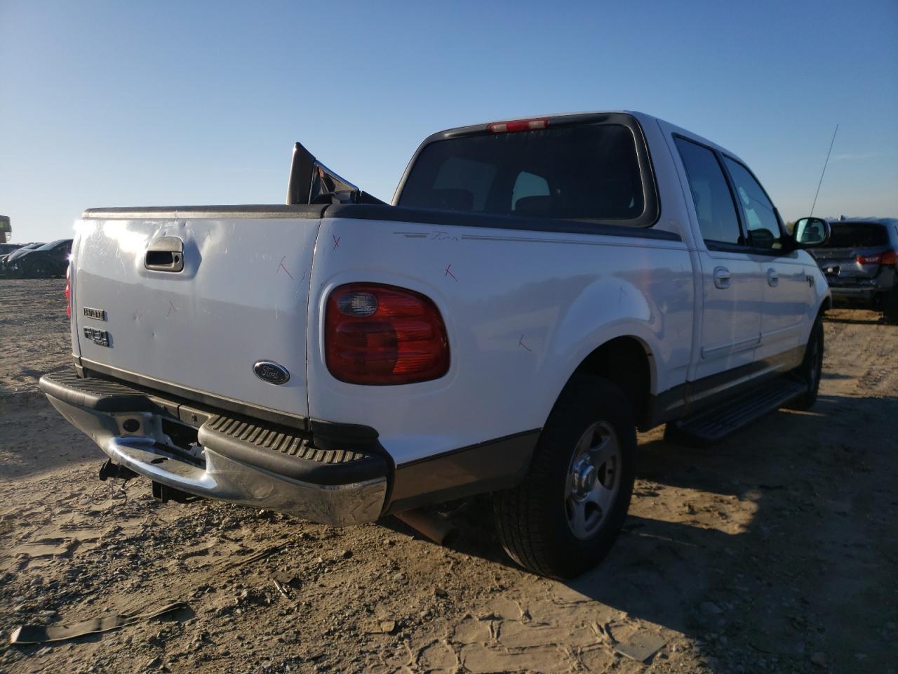 Photo 4 from auction – 2002 FORD F150 SUPER with VIN 1FTRW07602KE27380