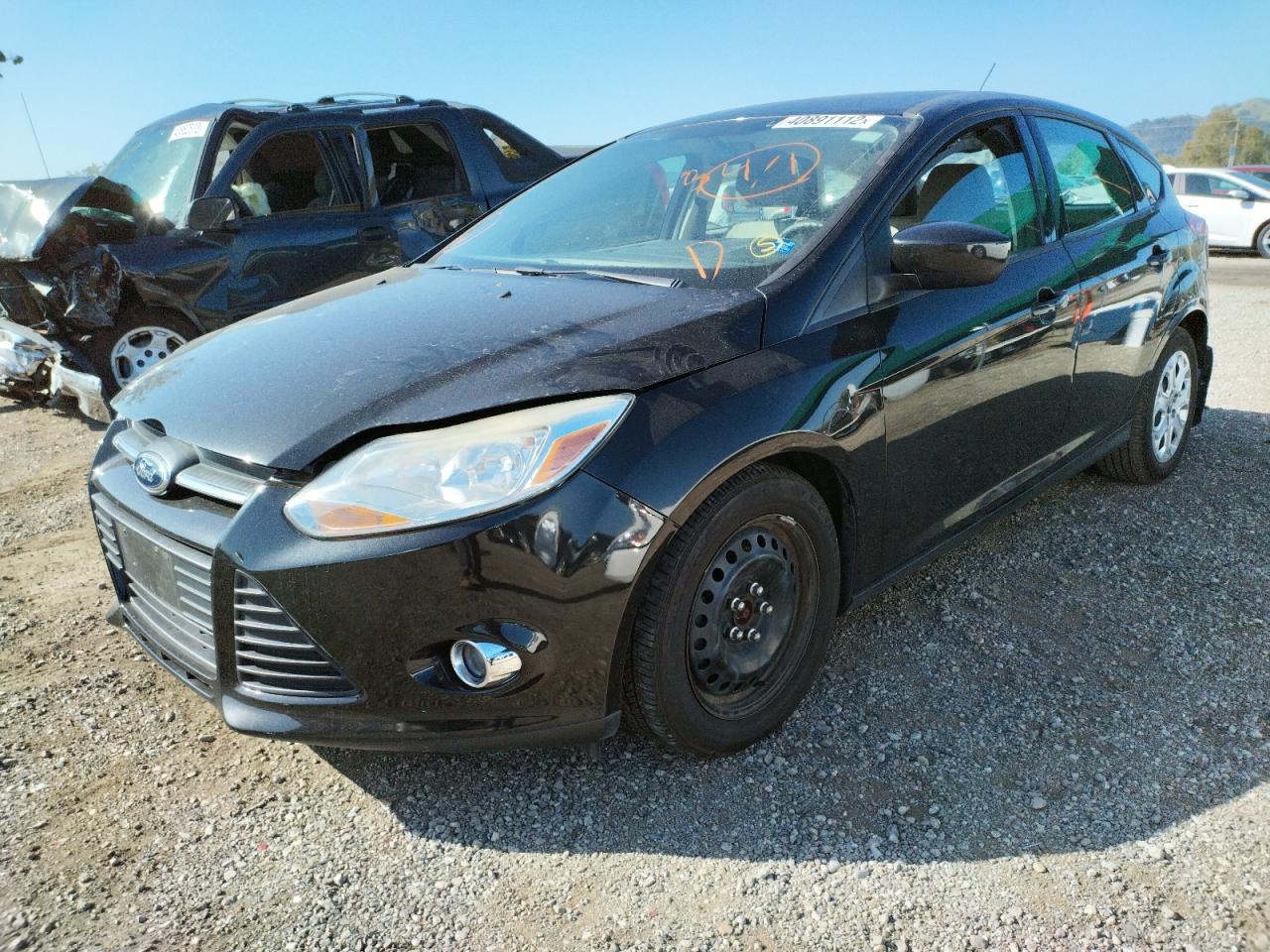 Foto 2 de la subasta – 2012 FORD FOCUS SE con VIN 1FAHP3K2XCL468521