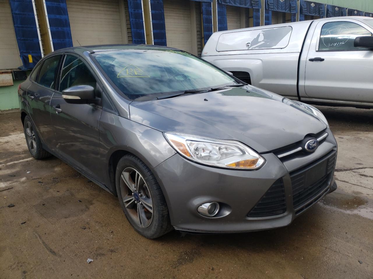 FORD FOCUS SE 2014 with VIN 1FADP3F25EL240986 - Photo from auction