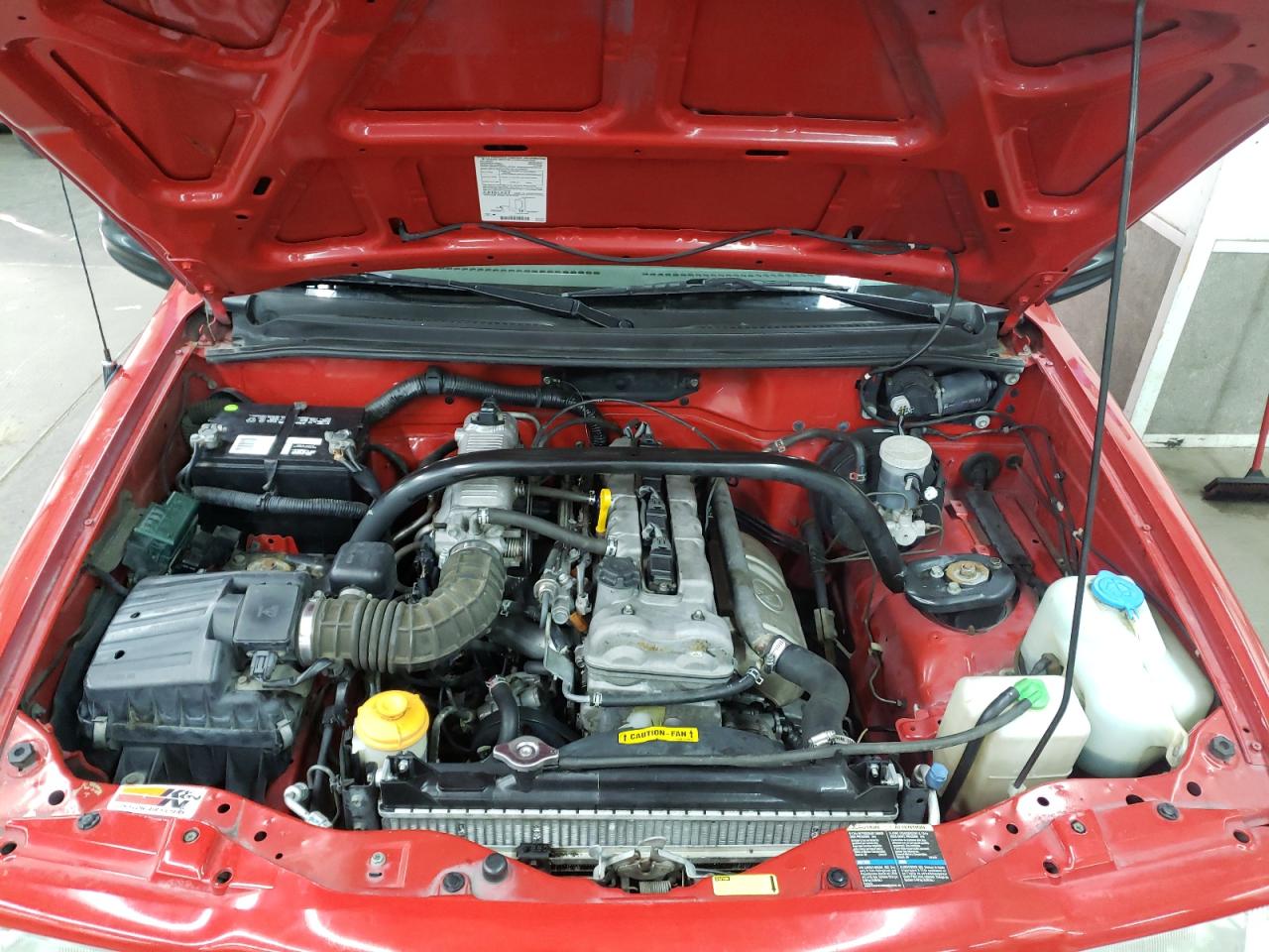 Photo 7 from auction – 2002 CHEVROLET TRACKER with VIN 2CNBJ13CX26928163