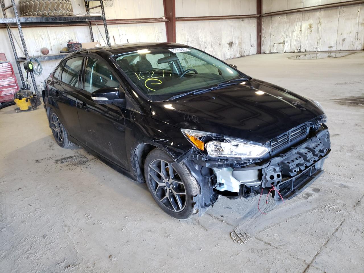 FORD FOCUS SE 2016 with VIN 1FADP3F21GL207762 - Photo from auction