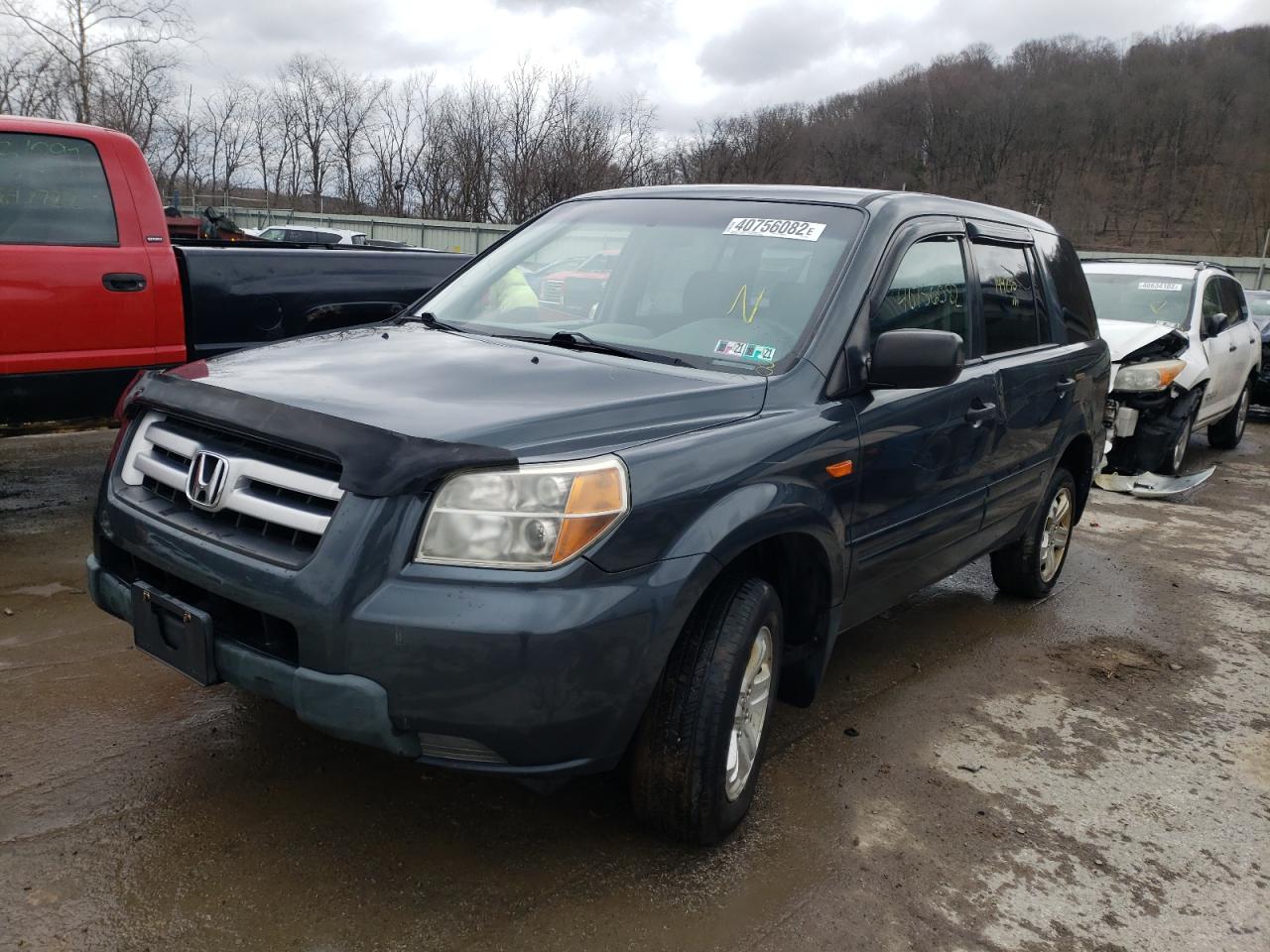Photo 2 from auction – 2006 HONDA PILOT LX with VIN 2HKYF18126H564152