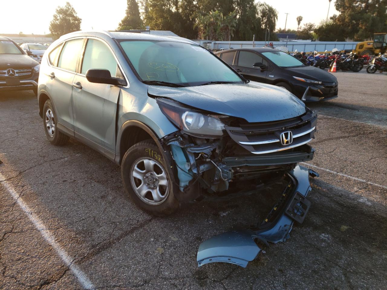 Photo 1 from auction – 2014 HONDA CR-V LX with VIN 2HKRM3H38EH540296