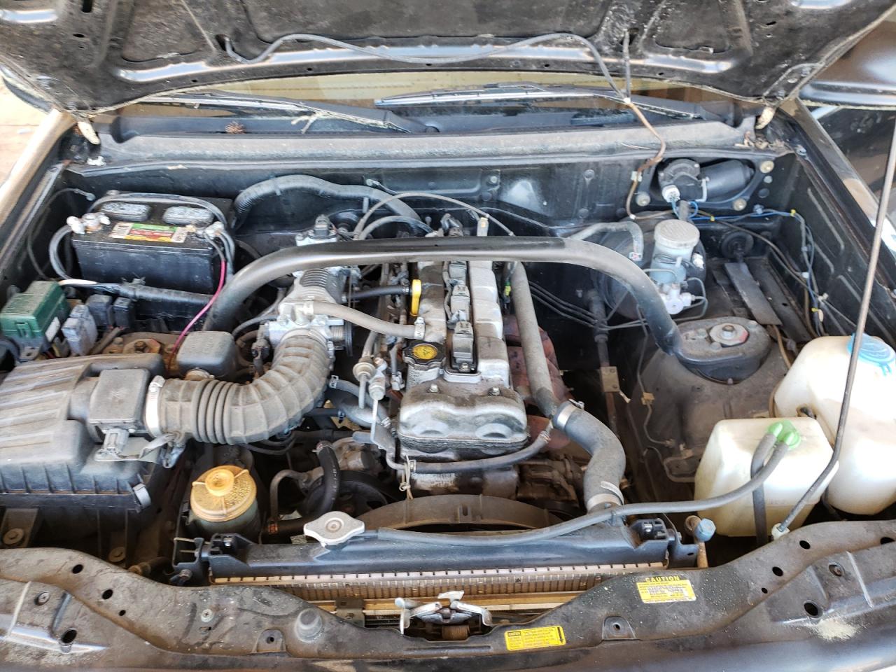 Photo 7 from auction – 1999 CHEVROLET TRACKER with VIN 2CNBE13C0X6923324