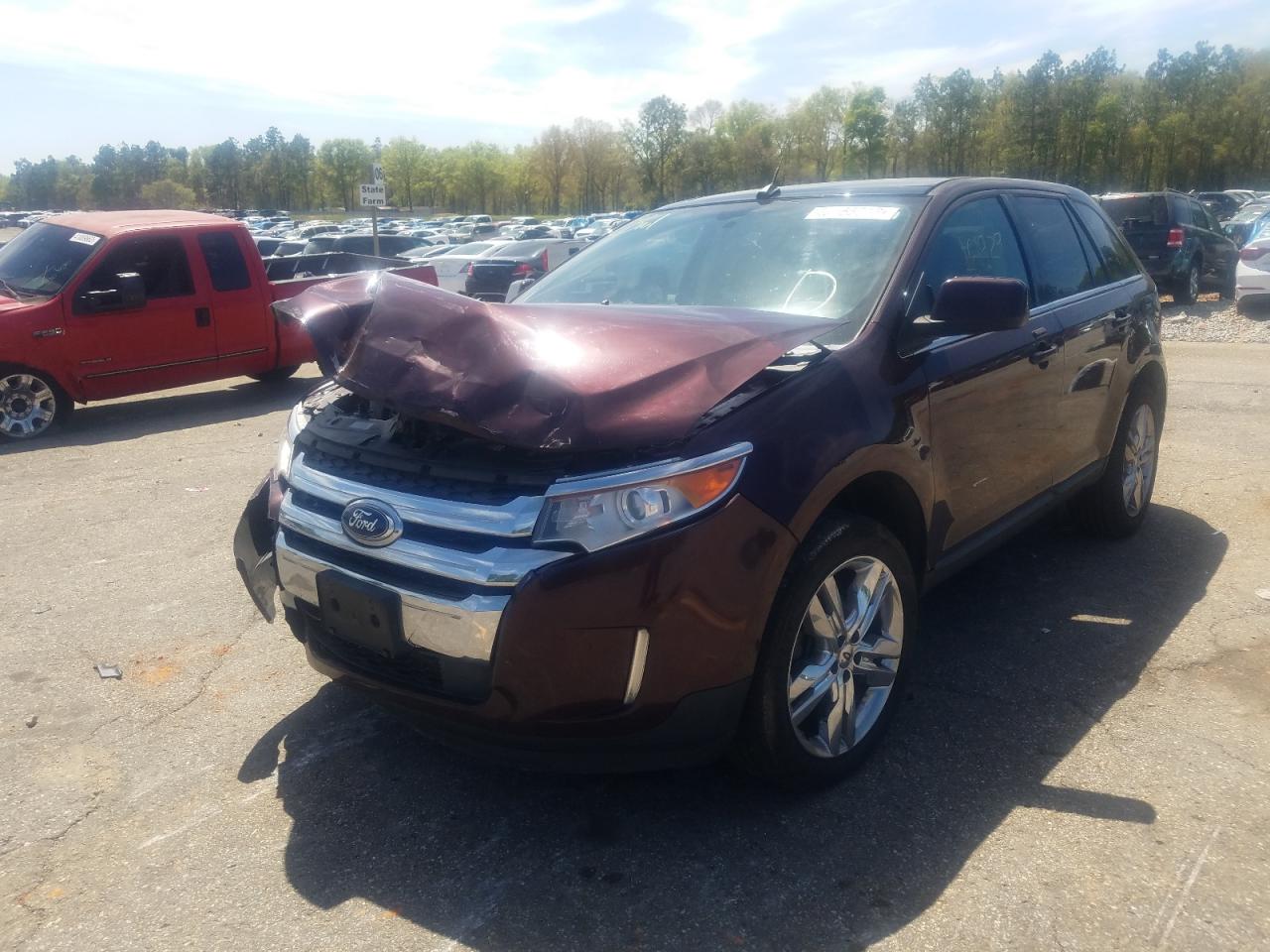 Photo 2 from auction – 2011 FORD EDGE LIMIT with VIN 2FMDK4KC5BBA28657